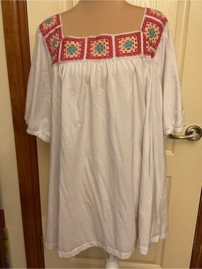 Woman Within White Top with Pink, Peach & Teal Crochet Detail